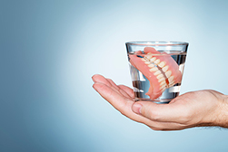 Dentures in a glas of water.